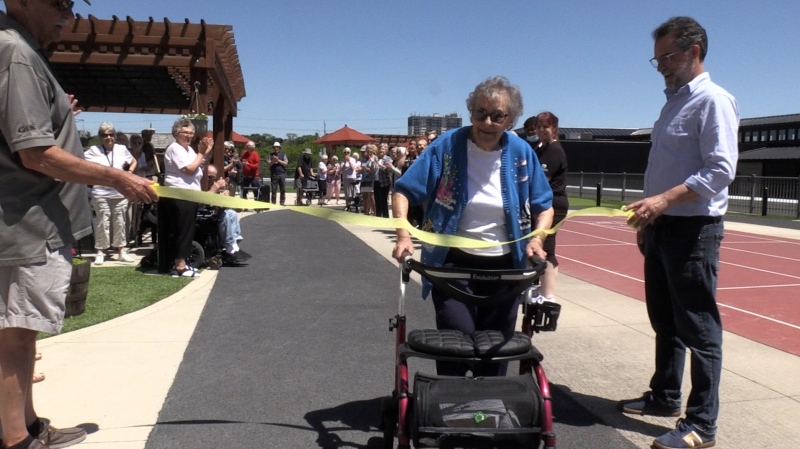 Joan Thomlinson finishing her 98th lap at Seasons Retirement Community in Cambridge, Ont. on May 31, 2024. (Colton Wiens/CTV Kitchener)