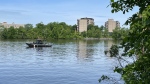 Montreal police (SPVM) are searching the river on June 2, 2024 after a vehicle plunged into the water in the Ahuntsic-Cartierville borough. (Matt Gilmour, CTV News)