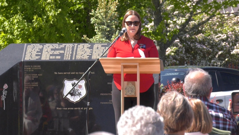 A ceremony honouring New Brunswick peace officers who have died in the line of duty returned as a public service on June 2, 2024 in Fredericton. Nadine Larche, the wife of Const. Douglas Larche who was killed in the line of duty in Moncton on June 4, 2014, spoke at the ceremony as a representative for families of fallen officers. (CTV/Nick Moore)