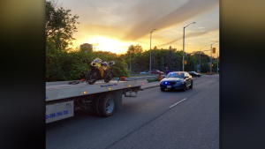 A motorcycle driver is facing charges after being caught on Highway 417 doing wheelies and weaving in and out of traffic, the Ontario Provincial Police (OPP) says. (OPP/ X)