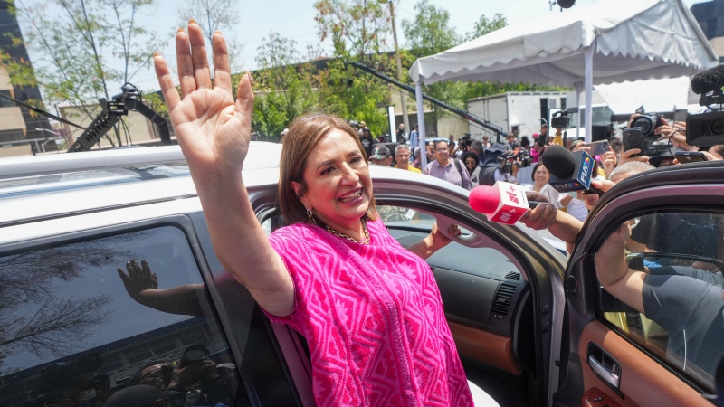Opposition presidential candidate Xóchitl Gálvez waves as she leaves a polling station after voting in the general election, in Mexico City, Sunday, June 2, 2024. (AP Photo/Fernando Llano)