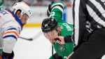 Edmonton Oilers center Sam Carrick, left, and Dallas Stars center Roope Hintz, right, face off during Game 5 of the NHL hockey Stanley Cup playoffs in Dallas on May 31, 2024. (Julio Cortez)