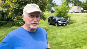 River Road resident Jim Morris is standing beside the scene of the collision that happened on June 2. (Sam Houpt/CTV News Ottawa)