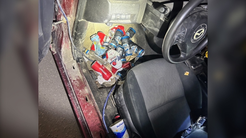 Cans of liquor were found in a car during a routine traffic stop, Sun. June 2, 2024. (Source: OPP)