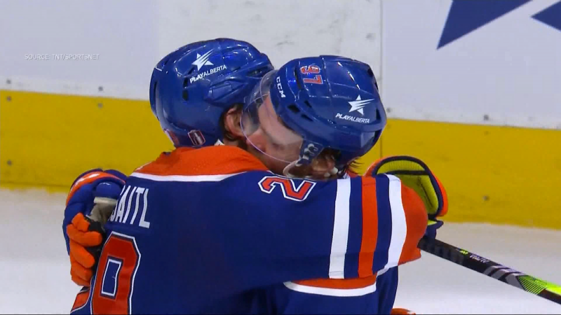 Connor McDavid and Leon Draisaitl hug after their Game 6 victory against the Dallas Stars on June 2, 2024, in the western conference final. 