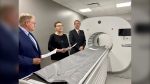 Sandra Mullin (centre) president and CEO of the QEII Foundation unveils the first StarGuide SPEC/CT scanner developed by GE HealthCare to be setup in Canada.