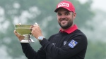Corey Conners holds the trophy Rivermead Cup after the Canadian Open golf tournament in Hamilton, Ontario on Sunday June 2, 2024. Conners was the top Canadian, shooting a 65 to reach 12 under. (Source: THE CANADIAN PRESS/Nathan Denette)