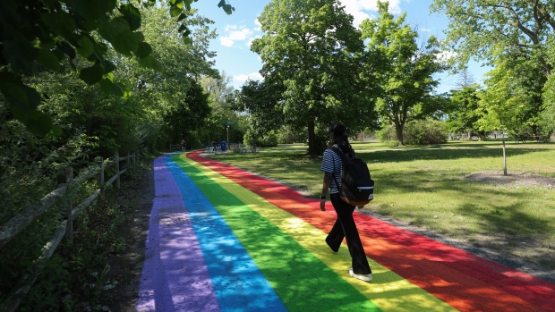 A view of the world's longest rainbow road. Measuring around nearly 600 metres, the "Long Walk to Equality" was unveiled ahead of Pride Month at Hanlan's Point in Toronto, Ontario, Canada, on May 30, 2024. 

Organizers say the rainbow road commemorates the significant queer and transgender history of the area while celebrating love, equality, and authenticity. The creative effort is led by award-winning artist Travis Myers, who is also the co-founder of the group, Friends of Hanlan's. Since 2022, the group has advocated for ecological protections to the site while championing the area's queer history. (Photo by Arrush Chopra/NurPhoto via Getty Images)