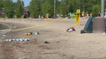 Yellow tape is up at Britannia Beach in Ottawa, where a child was pulled from the water in life-threatening condition. June 3, 2024. (Shaun Vardon/CTV News Ottawa)