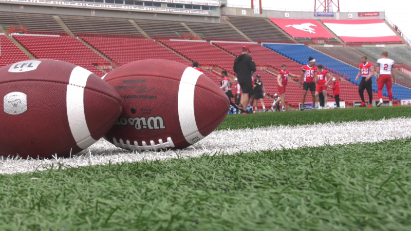 Footballs are seen at McMahon Stadium on June 3, 2024, as the Calgary Stampeders practice. (CTV News) 