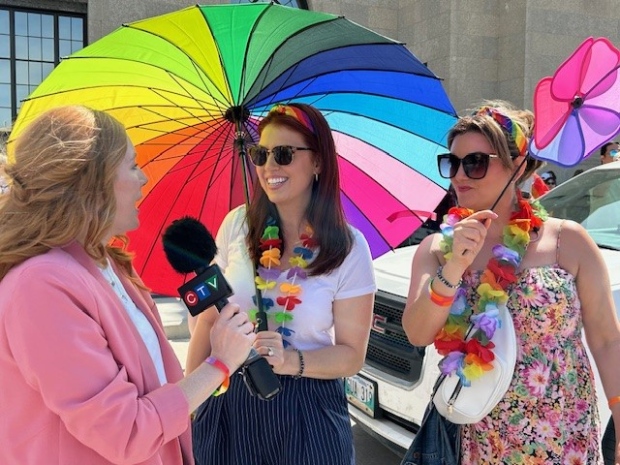 CTV's Katherine Dow, Terri Apostle and Rachel Legace take in the festivities during Winnipeg's Pride Parade on June 2, 2024. (CTV News Winnipeg)