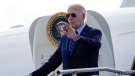 U.S. President Joe Biden waves as he arrives on Air Force One at Westchester County Airport in White Plains, N.Y., Monday, June 3, 2024. (AP Photo/Alex Brandon) 