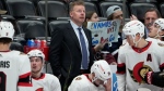 Ottawa Senators assistant coach Daniel Alfredsson stands behind players during the second period of the team's NHL hockey game against the Colorado Avalanche on Thursday, Dec. 21, 2023, in Denver. (AP Photo/David Zalubowski)