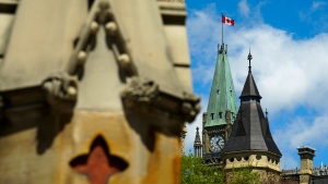 The Peace Tower on Parliament Hill is pictured from the West Gate in Ottawa on Monday, May 6, 2024. (Sean Kilpatrick/THE CANADIAN PRESS)