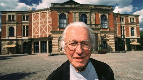 Wolfgang Wagner, a descendant of composer Richard Wagner, stands in front of the Festspielhaus theater in Bayreuth, Germany, in this July 21, 1998 file photo. (AP / Frank Boxler)