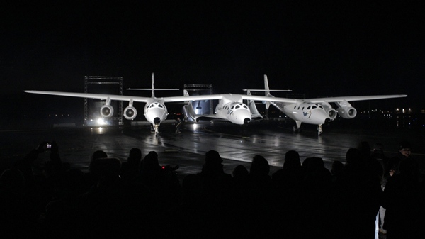 SpaceShipTwo, a spacecraft designed to take astronauts and a handful of wealthy tourists into space as early as 2011, is unveiled in Mojave, Calif., Monday, Dec. 7, 2009. (AP / Jae C. Hong)