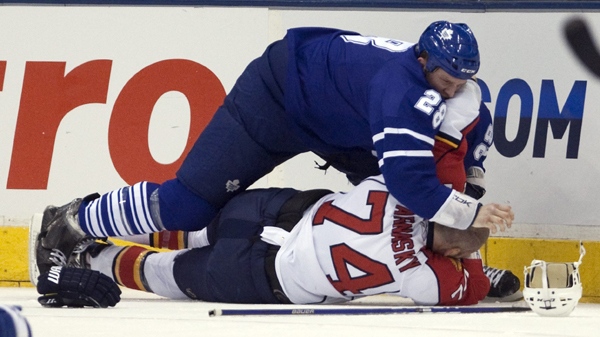 Toronto Maple Leafs right winger Colton Orr (top) slams Florida Panthers centre Nick Tarnasky (74) to the ice during a fight in first period NHL hockey action in Toronto on Tuesday March 23, 2010. (Frank Gunn/THE CANADIAN PRESS)