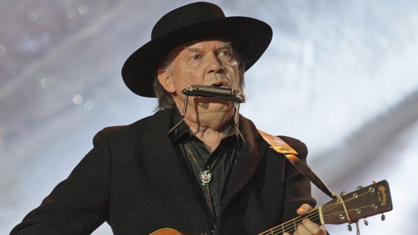 Canadian singer Neil Young performs during the closing ceremony for the Vancouver 2010 Olympics in Vancouver, British Columbia, Sunday, Feb. 28, 2010. (AP Photo/Jae C. Hong)