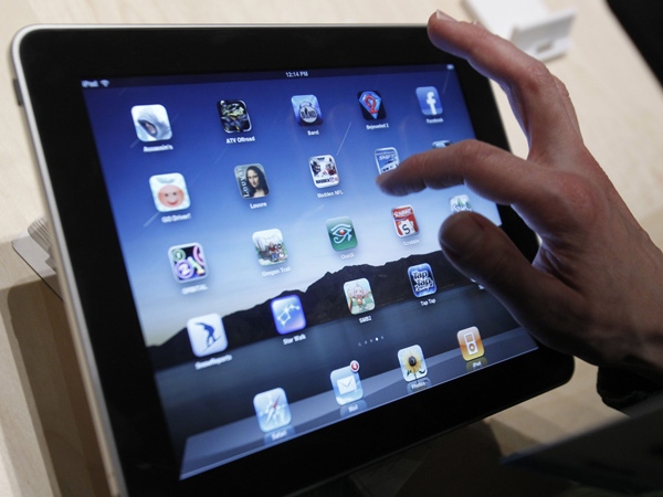 The iPad is shown after it was unveiled at the Moscone Center in San Francisco on Jan. 27, 2010. (AP Photo / Marcio Jose Sanchez)