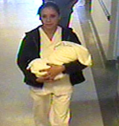 Sudbury police released this hospital surveillance still video image of a woman they are seeking in connection to an amber alert for an abducted newborn Thursday, Nov. 1, 2007. (CP / HO-Greater Sudbury Police Service)