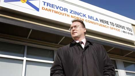 Nova Scotia MLA Trevor Zinck poses outside his constituency office in Dartmouth, Nova Scotia, on Thursday March 25, 2010. Zinck, who represents the riding of Dartmouth North, has been suspended from the Nova Scotia NDP party caucus because of issues surrounding his constituency bills. (Mike Dembeck / THE CANADIAN PRESS).
