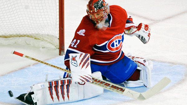 Montreal Canadiens goaltender Jaroslav Halak, of Slovakia, makes a save against the Buffalo Sabres during second period NHL hockey action in Montreal, Saturday, April 3, 2010. THE CANADIAN PRESS/Graham Hughes