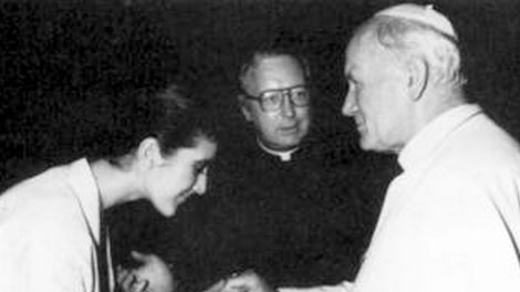 This 1984 photo shows Monsignor Bernard Prince, center, during a meeting between Canadian singer Celine Dion, left, and Pope John Paul II. A Feb. 1993 letter written by late Canadian Bishop Joseph Windle shows church officials in Canada knew of sexual abuse allegations involving Prince before his promotion to a top Vatican post and then discussed with Vatican officials how to keep the scandal from becoming public. (AP Photo/Arturo Mari)
