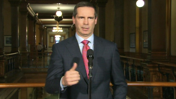 Ontario Premier Dalton McGuinty speaks to reporters from Queen's Park in Toronto, Wednesday, April 14, 2010.