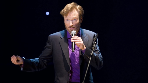 Conan O'Brien performs during a stop in 'The Legally Prohibited From Being Funny on Television Tour' in Vancouver, Tuesday, April 13, 2010. (Jonathan Hayward / THE CANADIAN PRESS)