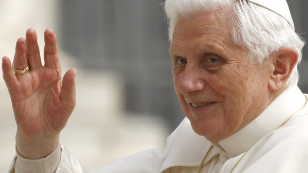Pope Benedict XVI waves from the popemobile during his weekly general audience, in St. Peter's Square at the Vatican, Wednesday, April 14, 2010. (AP / Pier Paolo Cito)