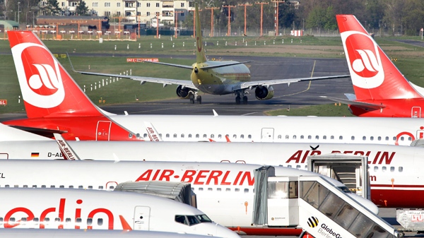 An airplane of the airline TUIfly.com is seen on the taxiway at the Tegel airport in Berlin Germany, Sunday, April 18, 2010. (AP / Michael Sohn)