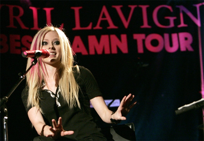 Avril Lavigne takes audience questions during an acoustic announcing her upcoming 'Best Damn Tour,' in West Hollywood, Calif. on Tuesday, Nov. 6, 2007. (AP / Reed Saxon)