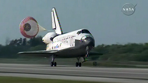 Space shuttle Discovery lands safely at Cape Canaveral, Fla., Tuesday, April 20, 2010.