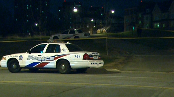 Toronto police investigate at the scene of what police call a 'severe sexual assault' near the York University campus, early Wednesday, April 21, 2010