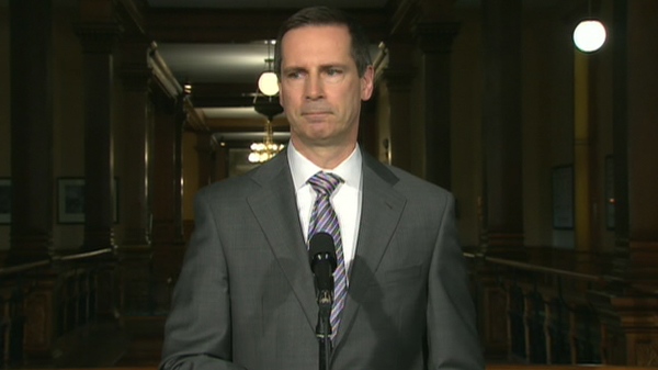 Ontario Premier Dalton McGuinty speaks to reporters from Queen's Park in Toronto, Wednesday, April 21, 2010.