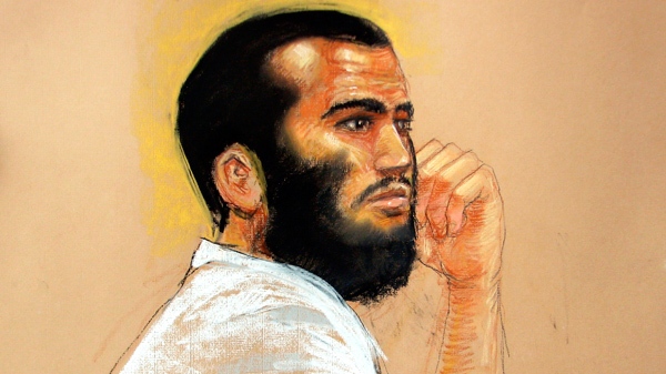 In this photo of a sketch by courtroom artist Janet Hamlin and reviewed by a U.S. Department of Defense official, Canadian defendant Omar Khadr attends his hearing in the courthouse for the U.S. military war crimes commission at the Camp Justice compound on Guantanamo Bay U.S. Naval Base in Cuba, Wednesday, April 28, 2010. (AP / Janet Hamlin)
