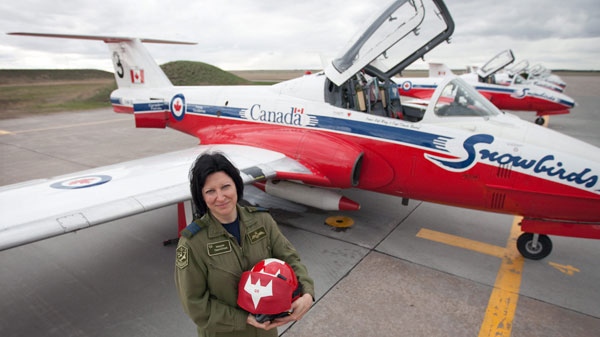 Lieutenant-Colonel Maryse Carmichael poses with her commanding officer helmet at 15 Wing Moose Jaw Air Force Base in Moose Jaw, Sask., on Monday, April 29, 2010. (Troy Fleece / THE CANADIAN PRESS)