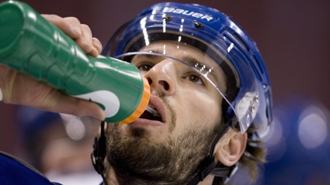 Vancouver Canucks' Ryan Kesler takes a drink of water during practice at GM Place in Vancouver, Wednesday, April 28, 2010. The Canucks will play the Chicago Blackhawks in game one of the second round of the NHL playoffs in Chicago on Saturday. THE CANADIAN PRESS/Jonathan Hayward