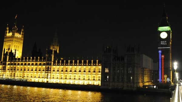 Election exit poll results are projected onto the Clock Tower of the Palace of Westminster, London, Thursday May 6, 2010. (AP / Tom Hevezi) 