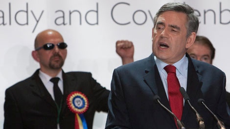British Prime Minister Gordon Brown, right, speaks after being re-elected as Member of Parliament for Kirkcaldy and Cowdenbeath Constituency at Kirkcaldy, Scotland, Friday, May 7, 2010. (AP / Chris Clark)