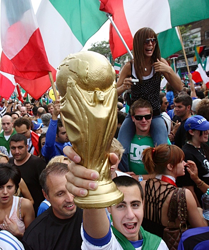 Thousands of soccer fans jammed the streets of Toronto's little Italy to celebrate following Italy's win in the World Cup soccer final on Sunday, July 9, 2006. (CP PHOTO/Frank Gunn)