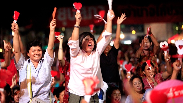 Anti-government protesters cheer and celebrate as they react to announcements made by their leaders in Bangkok, Thailand, Monday, May 10, 2010. (AP / Wong Maye-E)