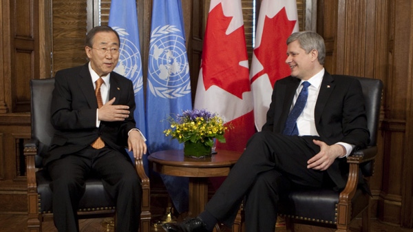 United Nations Secretary-General Ban Ki-Moon speaks with Prime Minister Stephen Harper at the start of a meeting on Parliament Hill in Ottawa, Wednesday May 12, 2010. (Adrian Wyld / THE CANADIAN PRESS)
