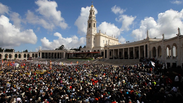 Faithful attend mass celebrated by Pope Benedict XVI at Fatima's Sanctuary, Portugal, on Thursday, May 13, 2010. (AP / Victor R. Caivano)