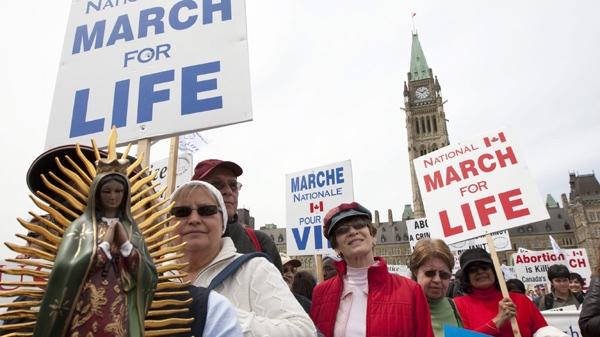 Anti-abortion activists march off of Parliament Hill in Ottawa on Thursday May 13, 2010. (Sean Kilpatrick / THE CANADIAN PRESS)