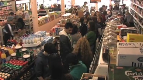 A video from the Carrotmob website shows a group in San Francisco shopping at a store that promises to improve its energy efficiency, 2008.  