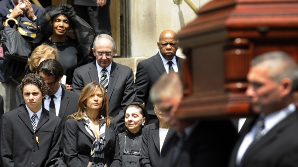 Granddaughter Jenny Lumet, centre, watches as the casket is carried from the church after the funeral for Lena Horne at the Church of St. Ignatius Loyola in New York, Friday, May 14, 2010. (AP / Stephen Chernin)