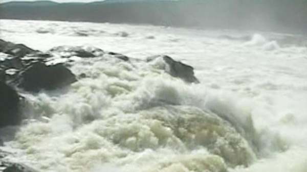 Rescue workers have not been able to locate the three young men who were swept over Muskrat Falls near Happy Valley-Goose Bay, N.L. on Tuesday, May, 18, 2010.