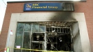 Damage is seen Wednesday, May 19, 2010 that was caused by a firebomb at an Ottawa downtown bank early Tuesday morning. (THE CANADIAN PRESS/Fred Chartrand)