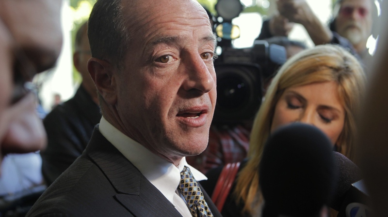 Michael Lohan, father of actress Lindsay Lohan, takes questions about his daughter, after a hearing on Thursday, May 20, 2010, in Beverly Hills, Calif. (AP / Damian Dovarganes)